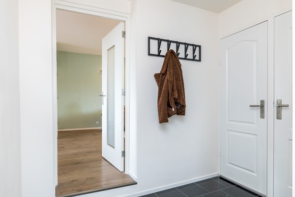 Foto - Te koop: Instapklare, monumentale woning met ruime woonkamer, tuinkamer en echte Amerikaanse veranda op een ruim perceel in Landgraaf.